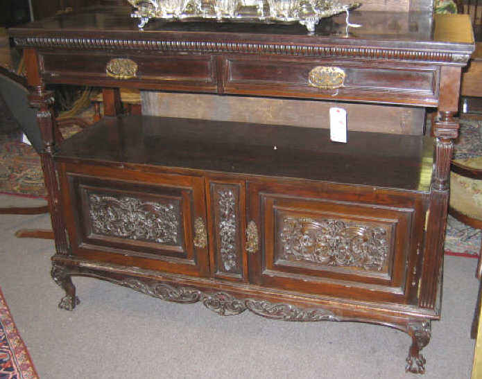 Appraisal: ENGLISH MAHOGANY BUFFET The rectangular top member with a pair