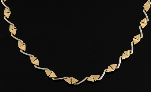 Appraisal: A modern two tone gold collar Of geometric design comprising