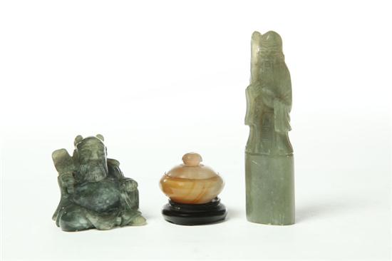 Appraisal: THREE STONE CARVINGS Asian th century Two monks probably in