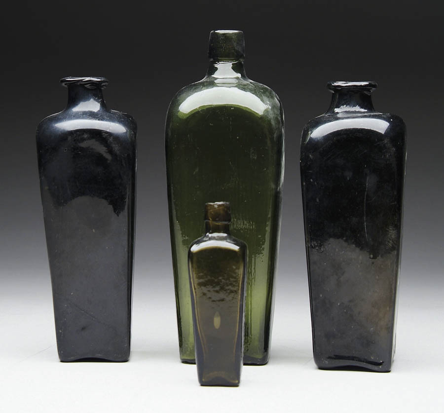 Appraisal: LOT OF FOUR GREEN TAPERED GIN BOTTLES Lot includes a