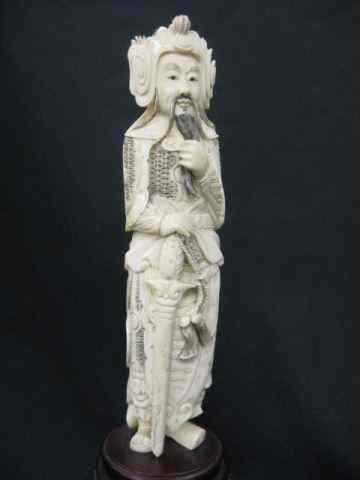 Appraisal: Chinese Carved Ivory Figurine of a Warrior tugging on his