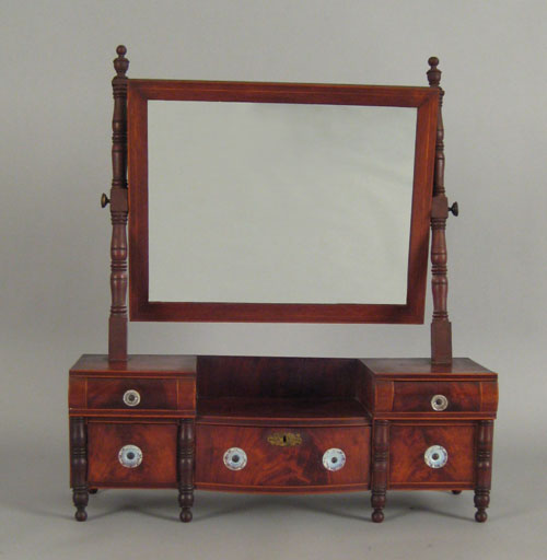 Appraisal: New England Sheraton mahogany shaving mirror ca h w