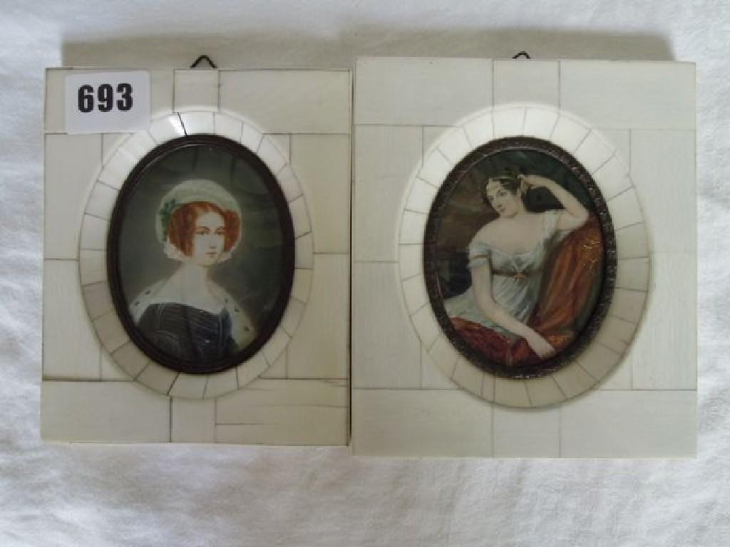 Appraisal: A pair of portrait miniatures of oval form in the