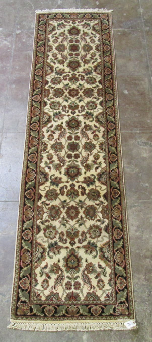 Appraisal: HAND KNOTTED ORIENTAL RUNNER Indo-Persian overall floral pattern on antique