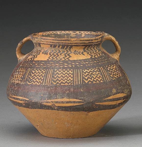 Appraisal: A small Neolithic pottery jar painted with zigzag and cowrie