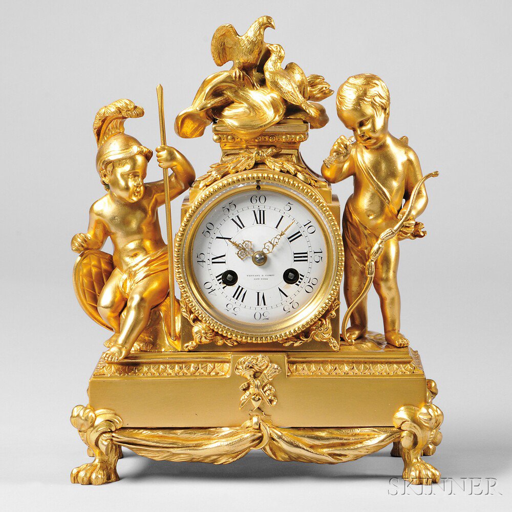 Appraisal: Tiffany Company Gilt Figural Mantel Clock France c the Roman