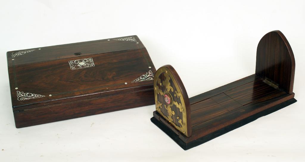 Appraisal: VICTORIAN ROSEWOOD VENEERED BRASS-MOUNTED BOOK SLIDE with pointed arch end