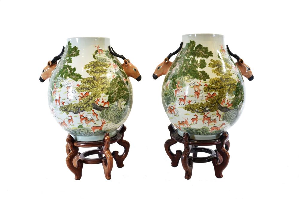 Appraisal: PAIR OF MASSIVE CHINESE DEER PORCELAIN VASESThe vessels with applied