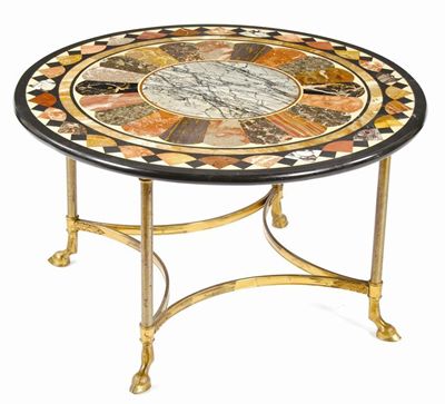 Appraisal: A specimen marble circular table on a gilt brass base