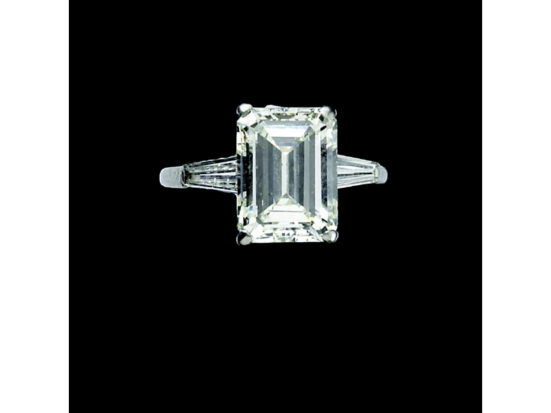 Appraisal: EMERALD CUT DIAMOND RING Platinum traditional style solitaire engagement ring