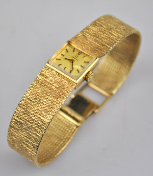 Appraisal: A lady's ct gold Omega wristwatch with square dial and