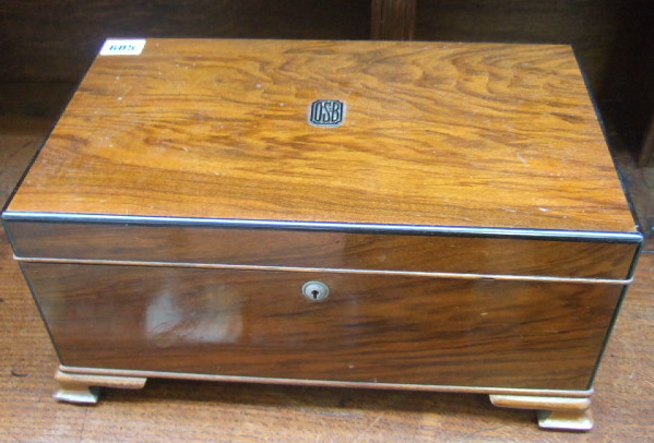 Appraisal: A 's walnut humidor with central initials and ogee bracket