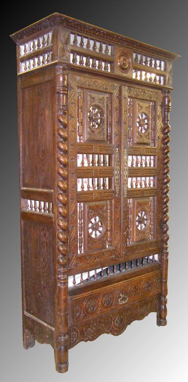 Appraisal: th century Continental carved oak cupboard the two doors with