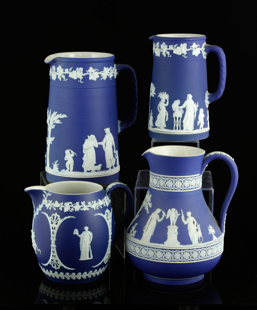 Appraisal: - Wedgwood Pitchers Lot of four blue and white Wedgwood