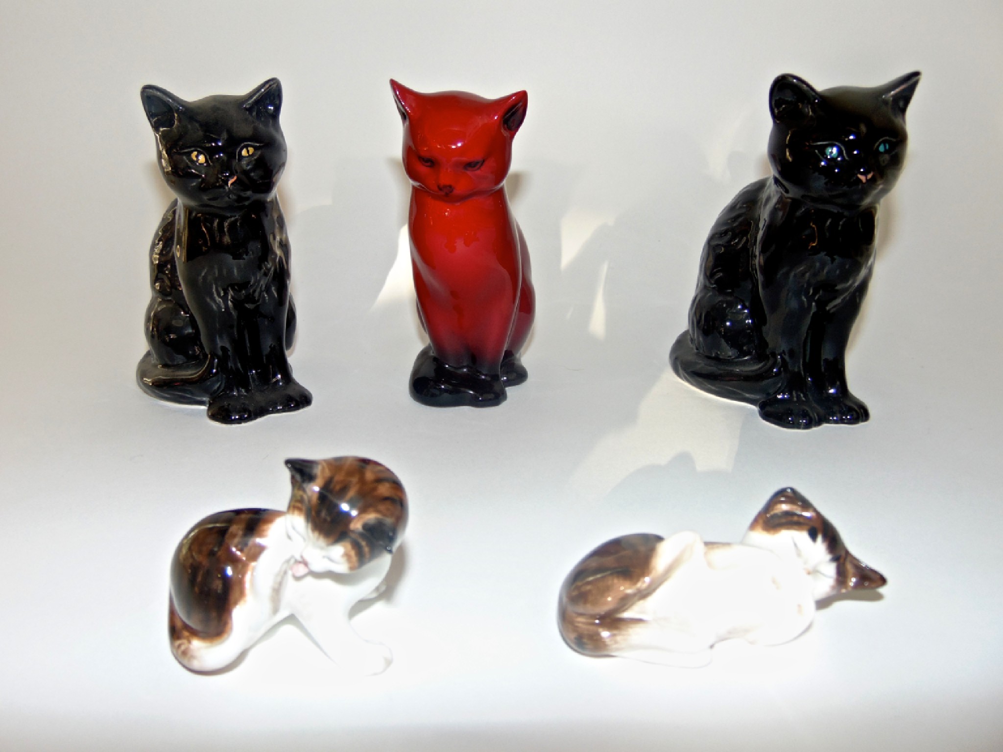 Appraisal: A Royal Doulton Flamb model of a seated cat with