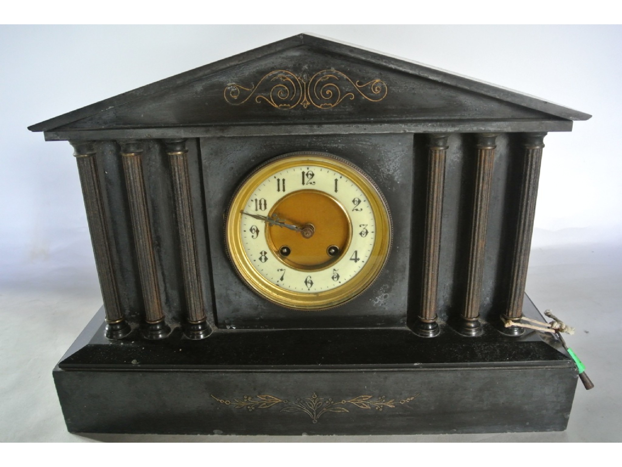 Appraisal: A Victorian black slate mantle clock of architectural form with