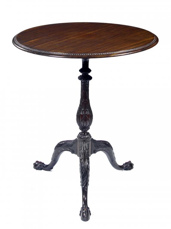 Appraisal: A VICTORIAN MAHOGANY TRIPOD TABLE the rope-edged circular top on