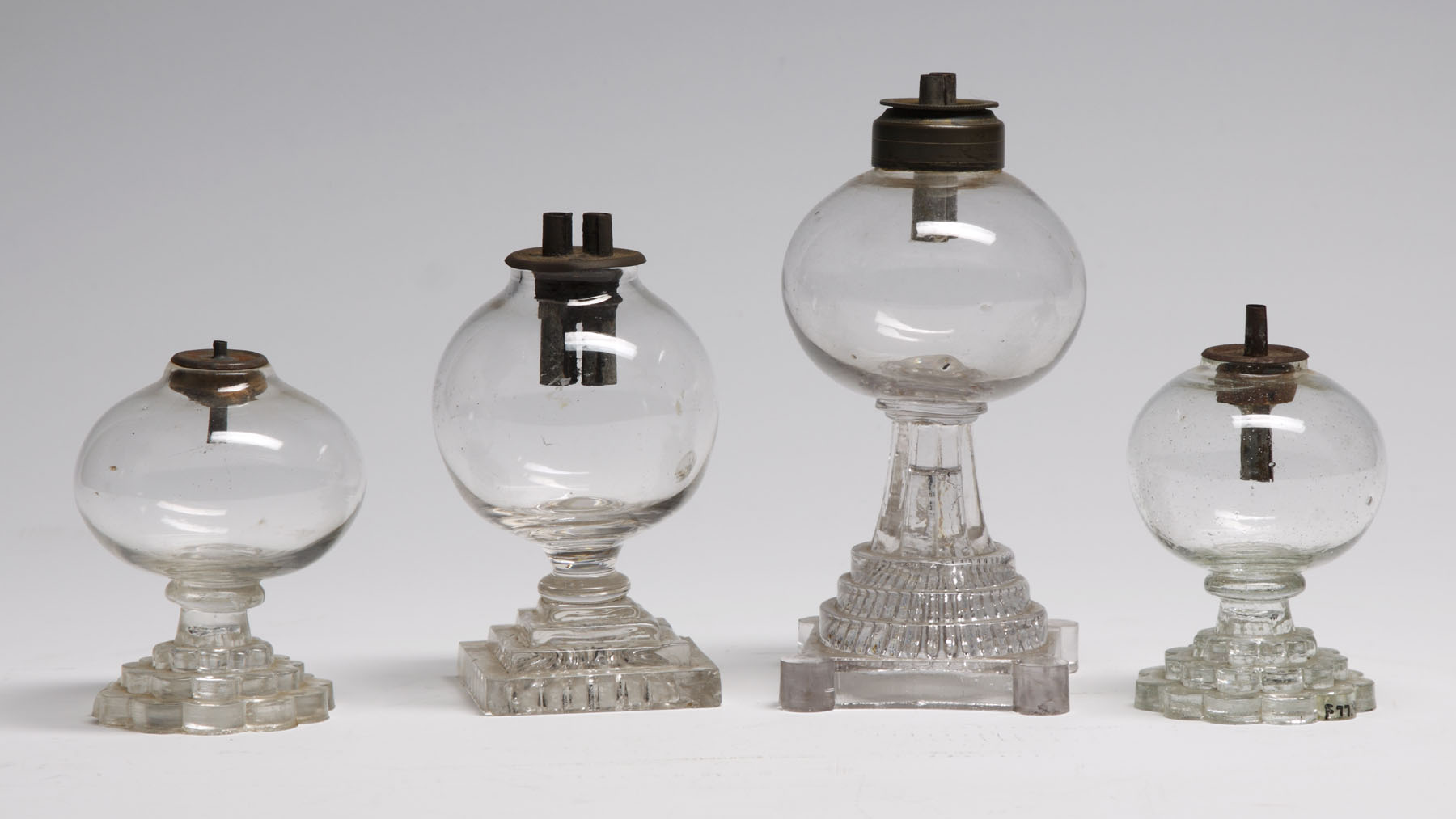 Appraisal: Early Whale Oil Lamps L to R Chip to base