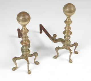 Appraisal: A pair of Continental iron and brass andirons Late th