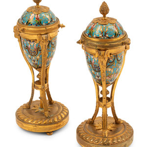 Appraisal: A Pair of Louis XVI Style Gilt Bronze Mounted Champlev