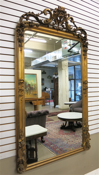 Appraisal: A LARGE VICTORIAN OVERMANTEL MIRROR American th century a rectangular