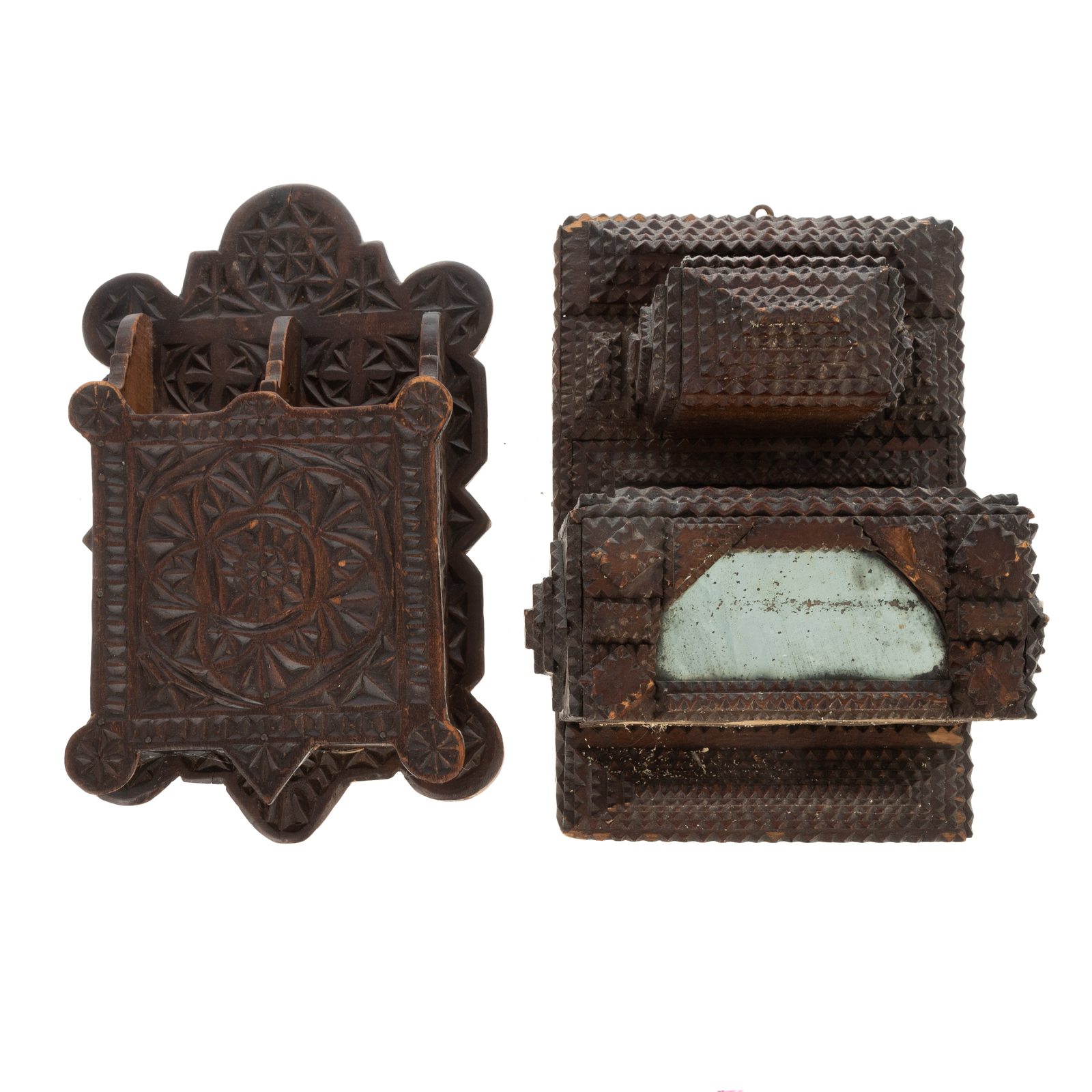 Appraisal: TWO TRAMP ART CARVED WALL POCKETS Notch carved with mirrored