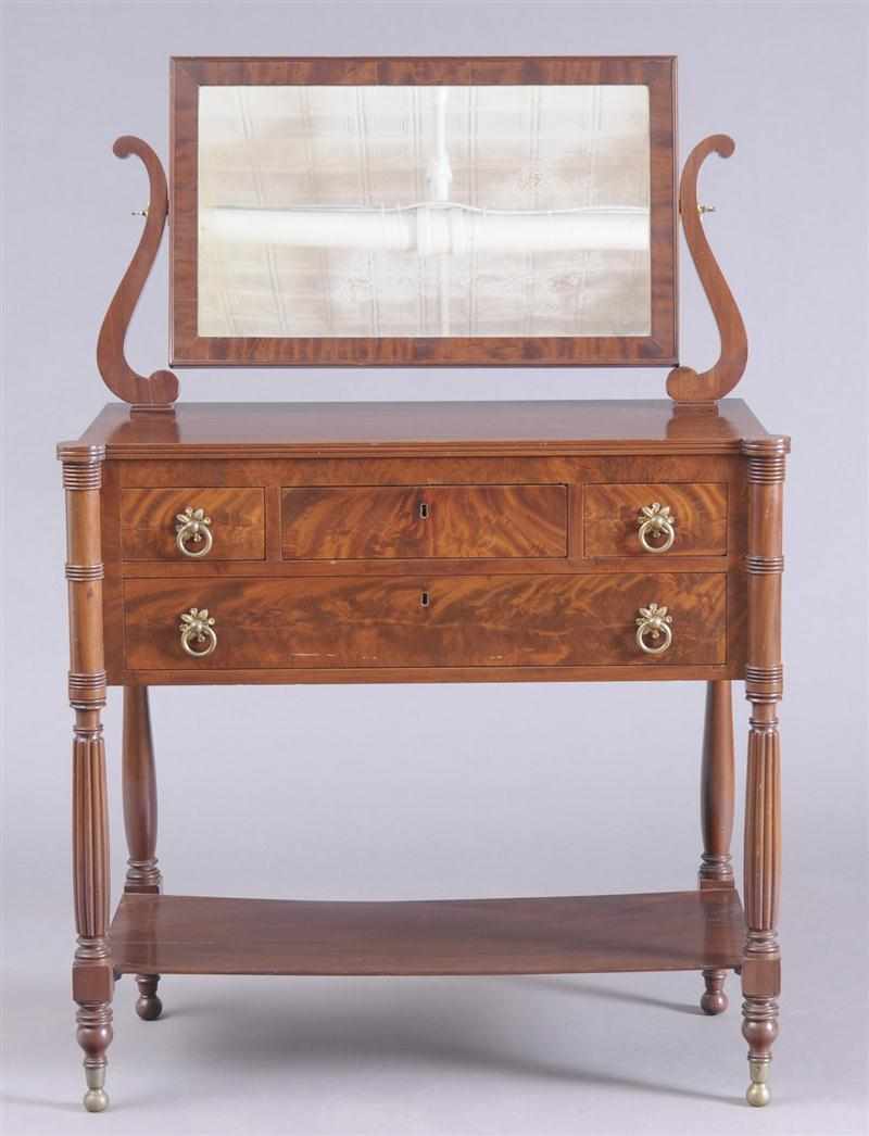 Appraisal: NEW YORK CLASSICAL CARVED MAHOGANY DRESSING CHEST The adjustable mirror