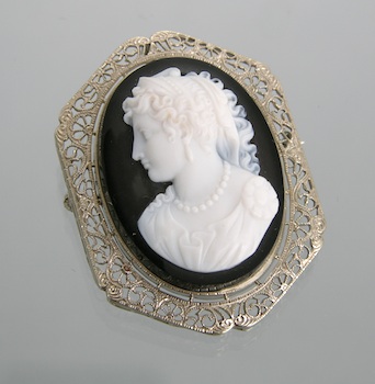 Appraisal: A Very Finely Carved Stone Cameo in Gold Filigree Frame