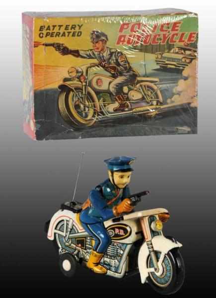 Appraisal: Tin Police Motorcycle Battery-Operated Toy Description Japanese Working Scarce toy