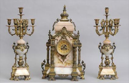 Appraisal: FRENCH RENAISSANCE-STYLE PAINTED AND GILT-METAL MOUNTED ONYX THREE-PIECE CLOCK GARNITURE