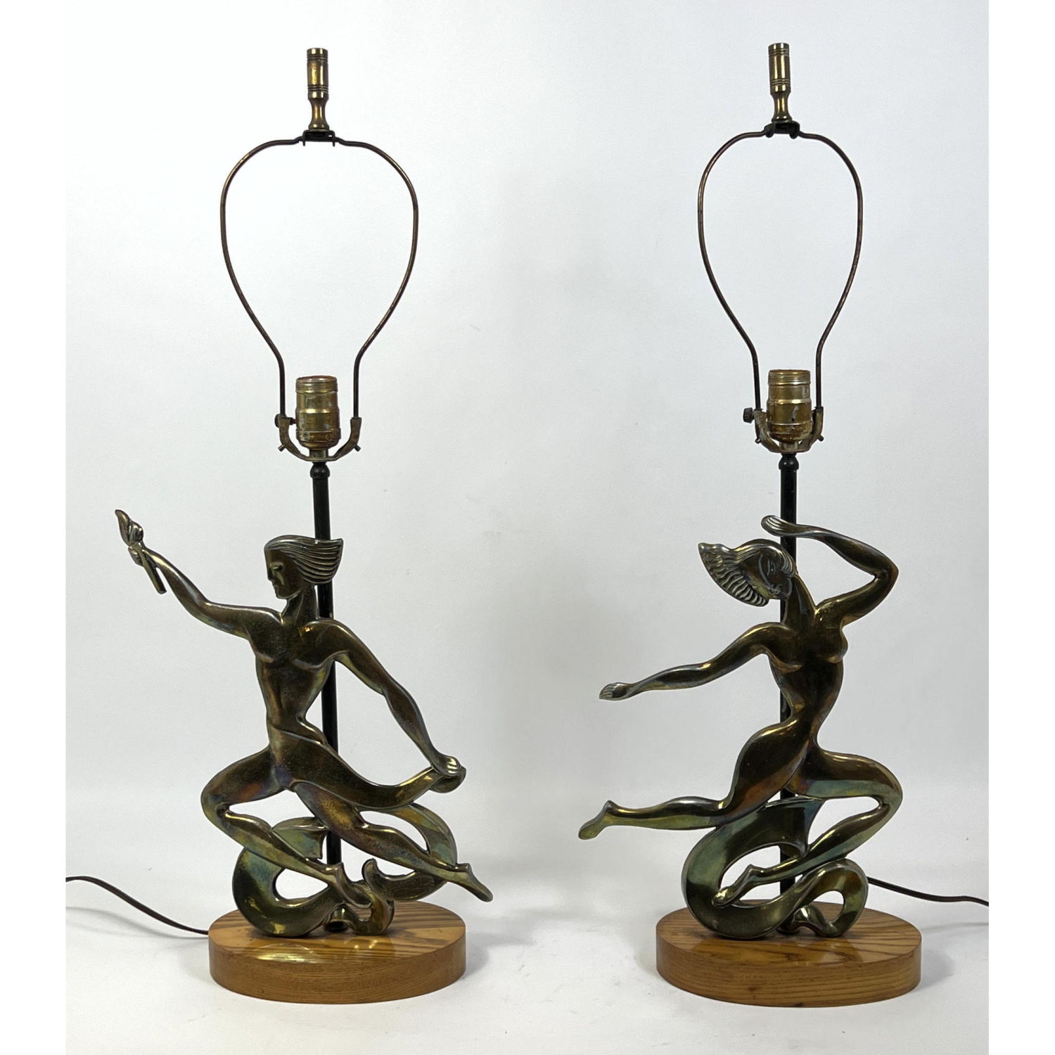 Appraisal: Pr Art Deco Figural Metal Table Lamps Male and Female