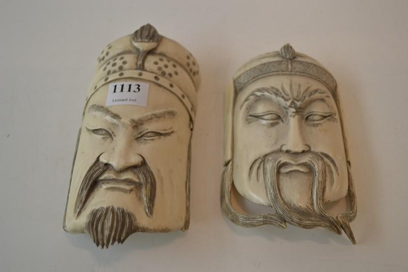 Appraisal: TWO CHINESE IVORY CARVED WARRIOR PLAQUES