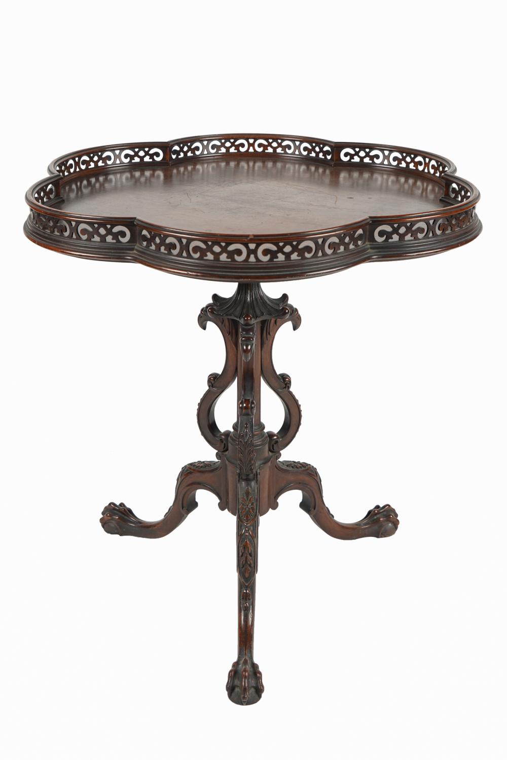 Appraisal: AMERICAN MAHOGANY TRIPOD TABLEthe lobed top with pierced gallery rim