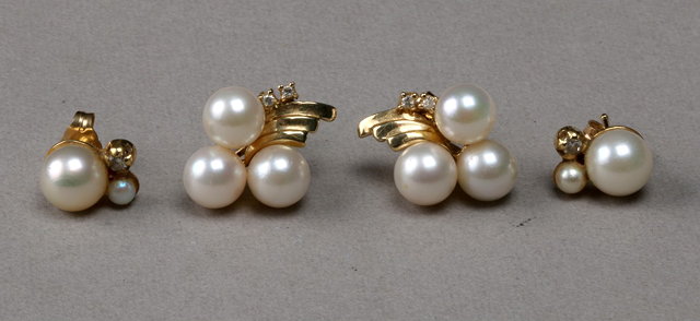 Appraisal: A PAIR OF PEARL SET EAR STUDS three peg set