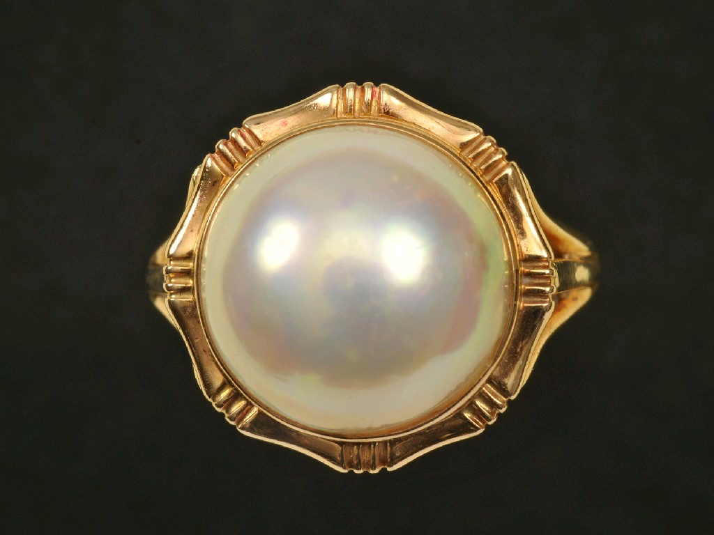 Appraisal: A Continental Mabe Pearl Ring in gold stamped k