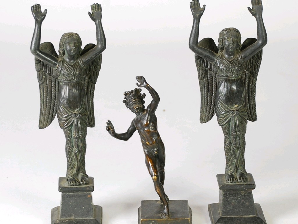 Appraisal: A PAIR OF TH CENTURY DARK PATINATED BRONZE FIGURES OF