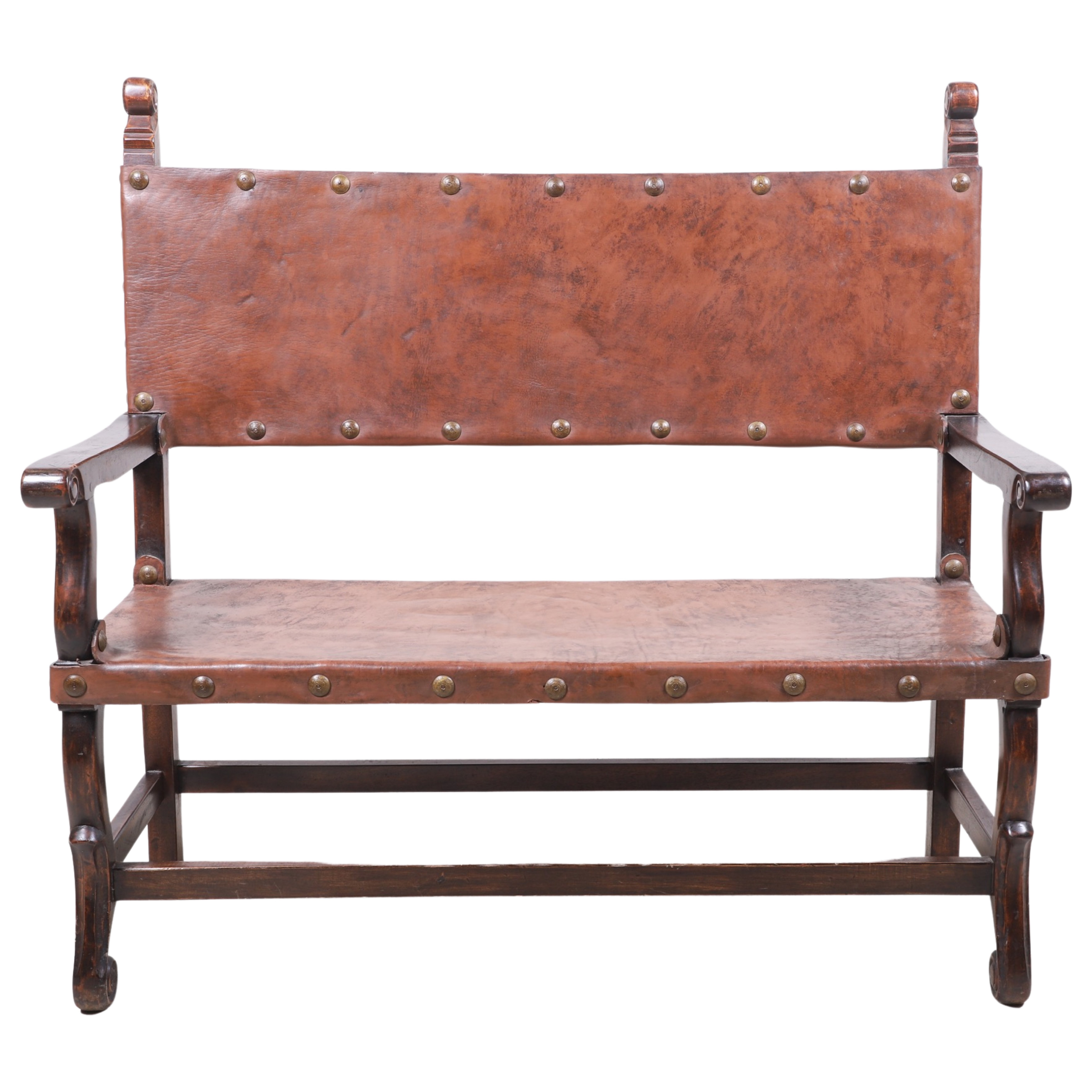 Appraisal: South Cone carved leather bench scrolled top over tacked leather