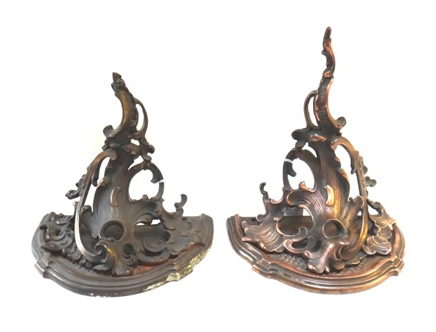 Appraisal: A pair of Victorian bronzed iron wall brackets each of