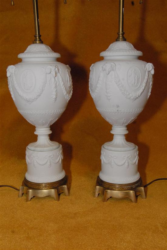 Appraisal: PAIR FIGURAL URN LAMPS Paris porcelain Rams heads