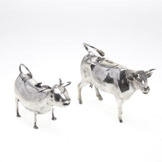 Appraisal: Two Dutch sterling cow creamers Two Dutch sterling cow creamers