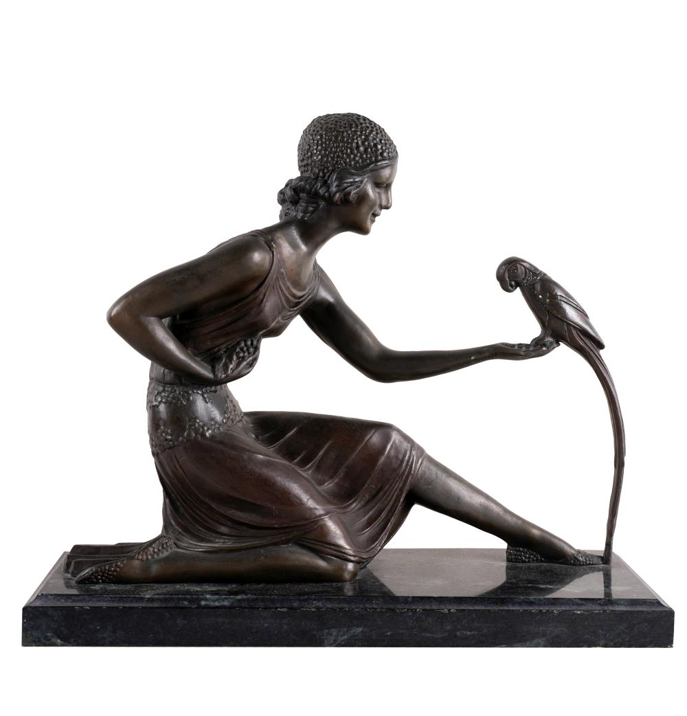 Appraisal: BRONZE FIGURE OF A WOMAN WITH BIRDsigned to base set