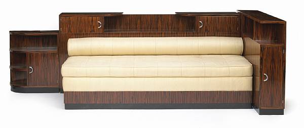 Appraisal: An Art Deco upholstered daybed s macassar-ebony and silk upholstery