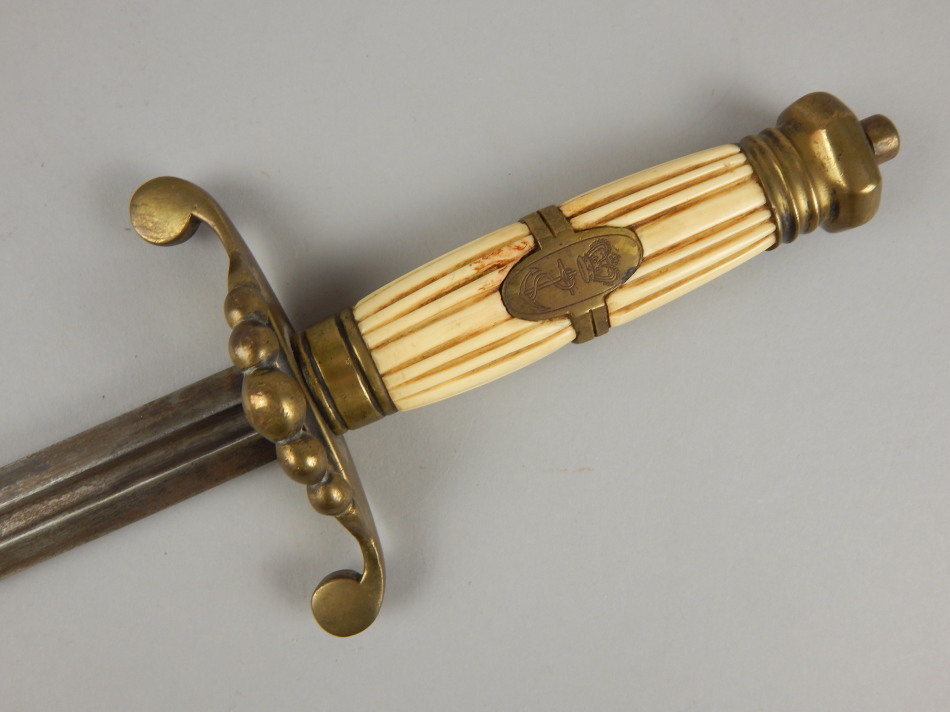 Appraisal: A replica naval officer's -ball dirk with brass mounts engraved