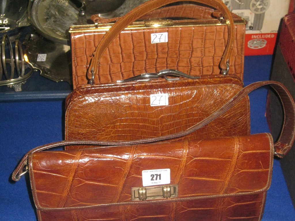 Appraisal: Lot comprising three animal skin handbags