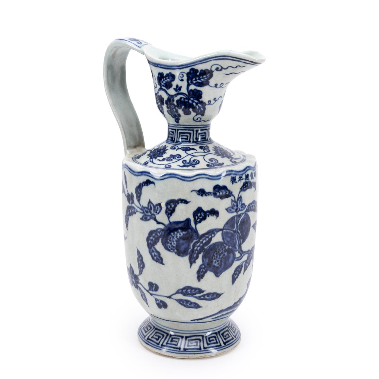 Appraisal: CHINESE MING STYLE BLUE WHITE FLORAL EWER Chinese Ming style