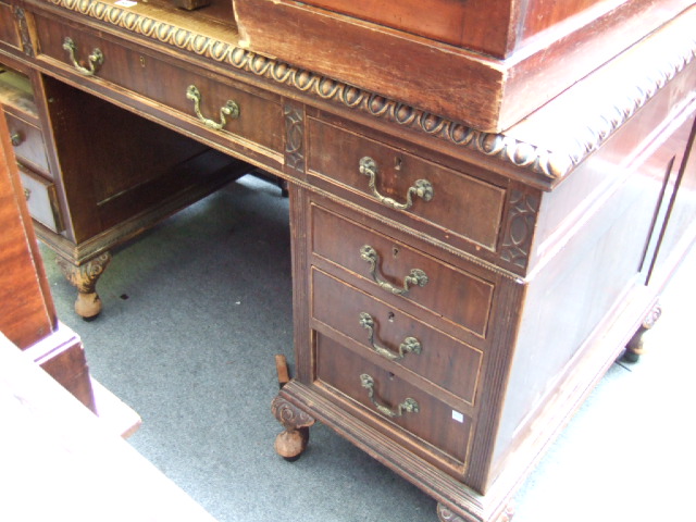 Appraisal: A George III style mahogany pedestal desk the tooled brown