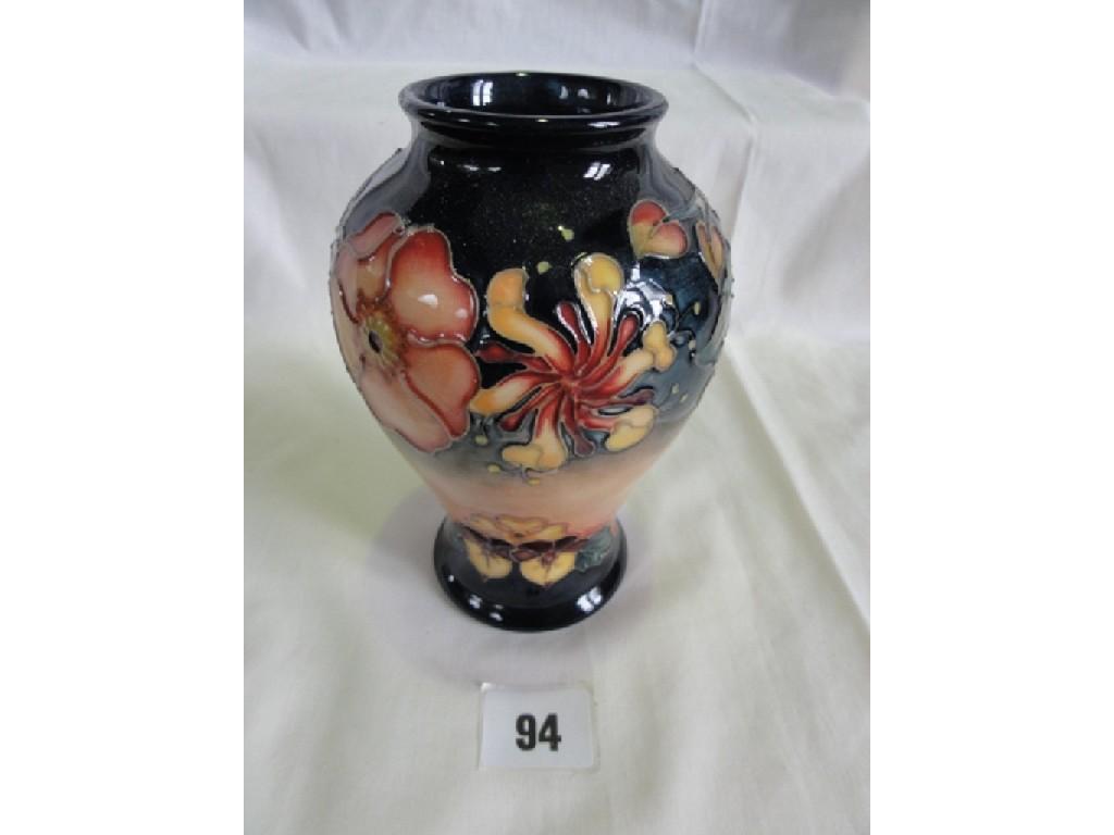 Appraisal: A Moorcroft Pottery vase in the dog rose and honeysuckle