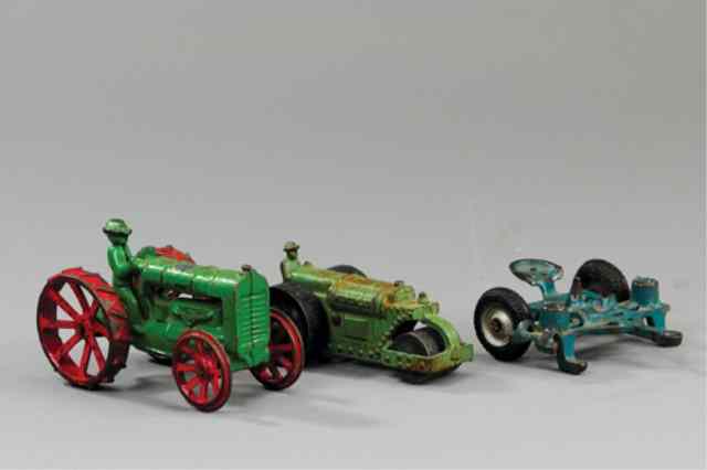 Appraisal: LOT OF TWO SMALL TRACTORS Includes Hubley Hercules road roller