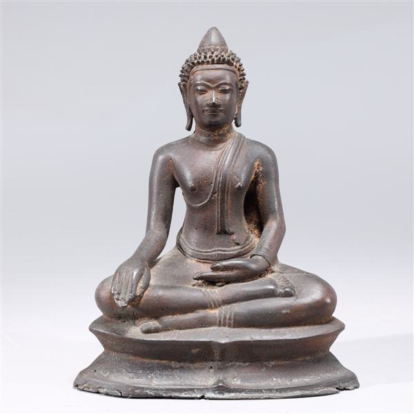 Appraisal: Antique Chinese bronze seated Buddha in the Bhumisparsha mudra some