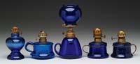 Appraisal: FIVE COBALT MINI LAMPS S - Handy S - Pair